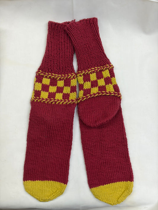 hand knitted cotton socks with braided check pattern in red and mustard