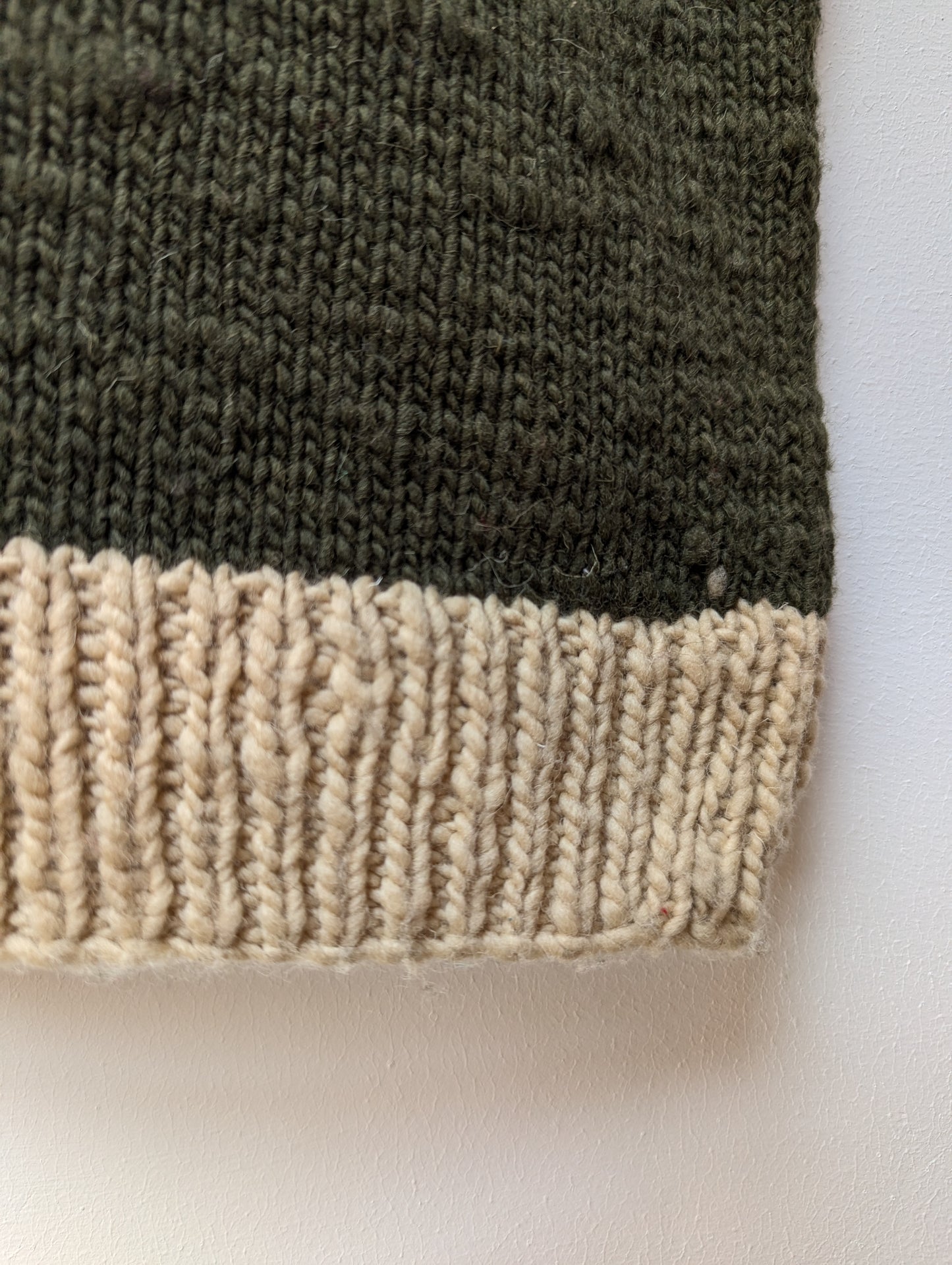 Darcha handloom wool knit vest colour olive greeen front close right lower view for men and women