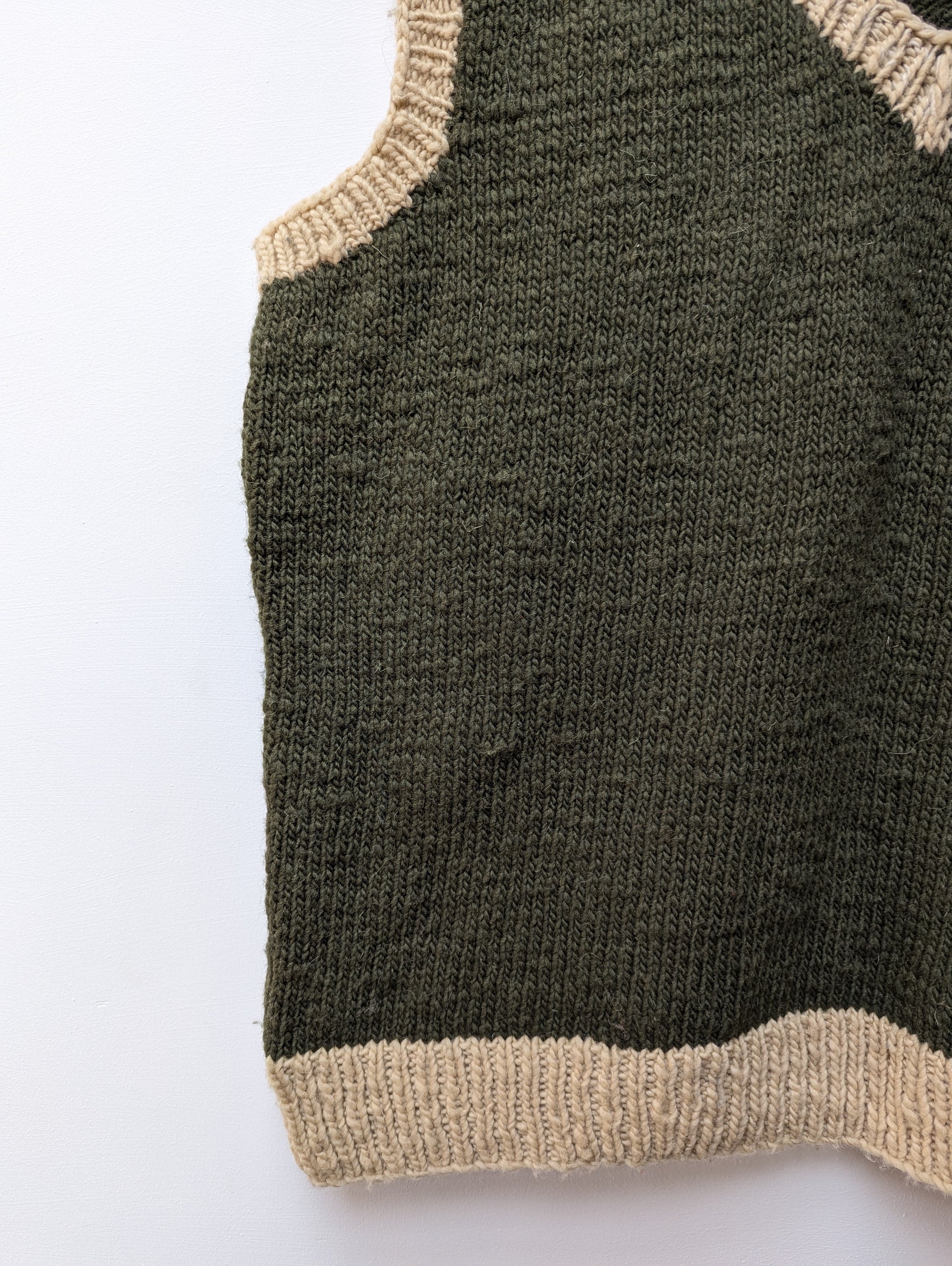 Darcha handloom wool knit vest colour olive greeen front right lower view for men and women