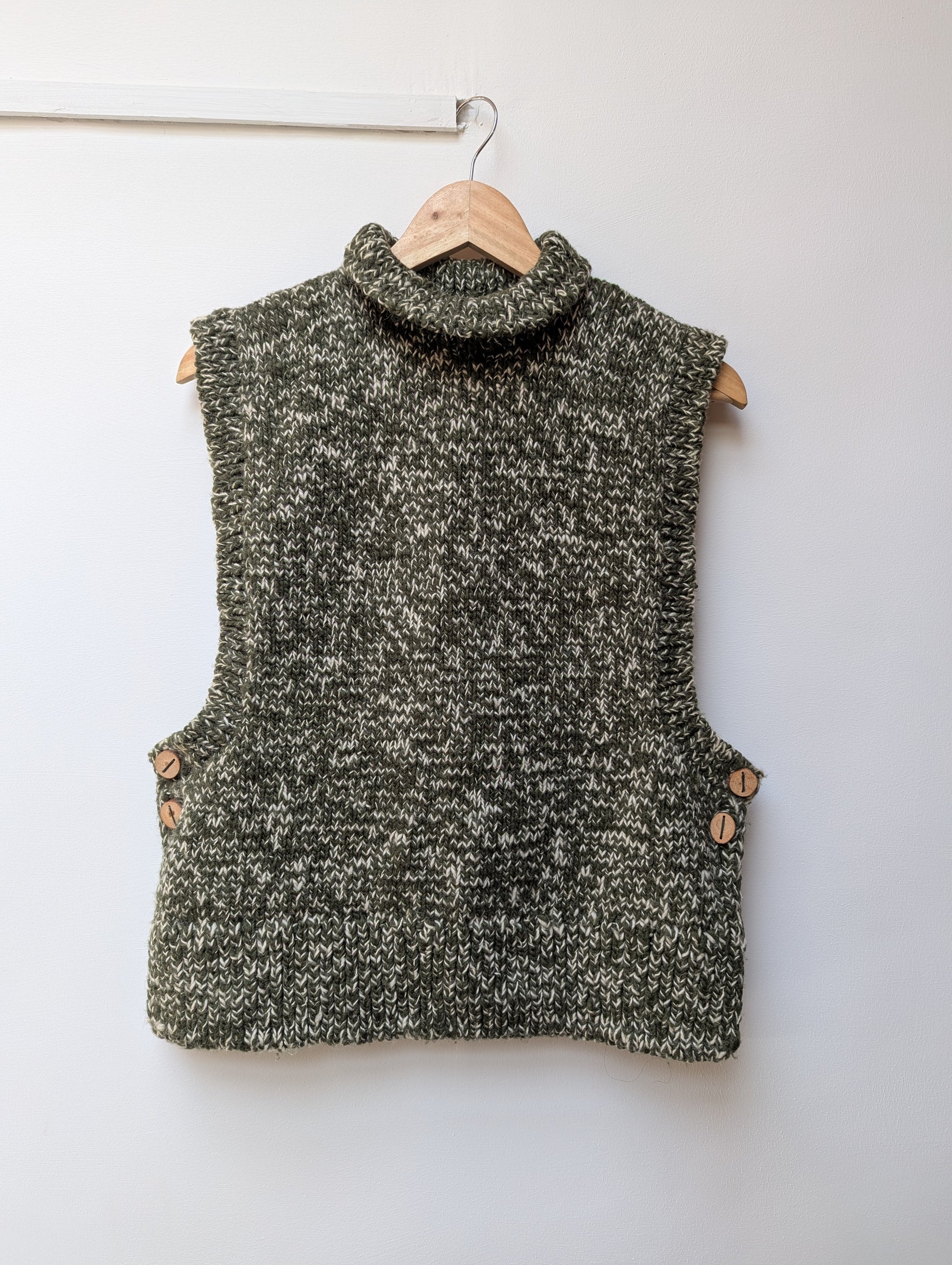 High neck handloom front view wool knit vest for men and women in forest green 