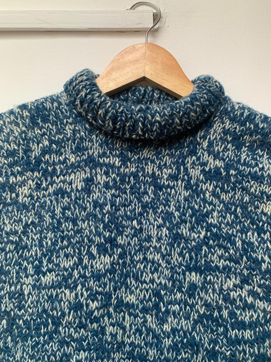 High neck handloom wool knit vest for men and women in steel blue upper view