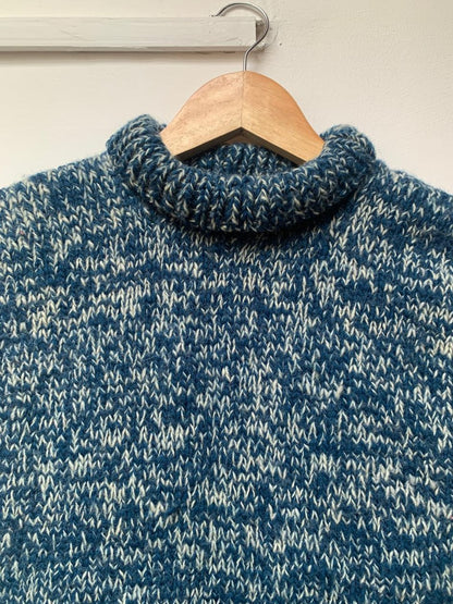 High neck handloom wool knit vest for men and women in steel blue upper view