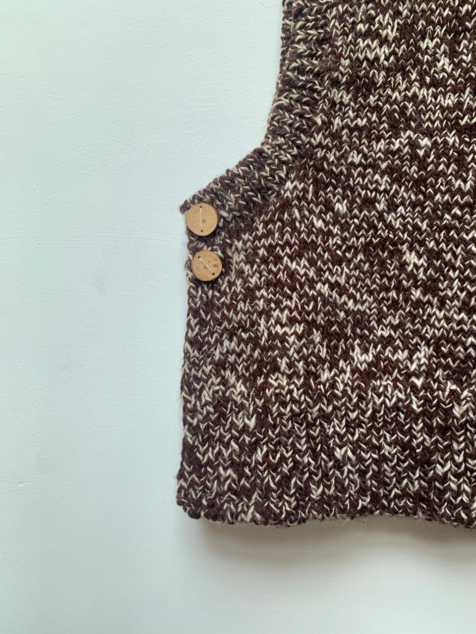 High neck handloom wool knit vest for men and women in walnut brown lower left