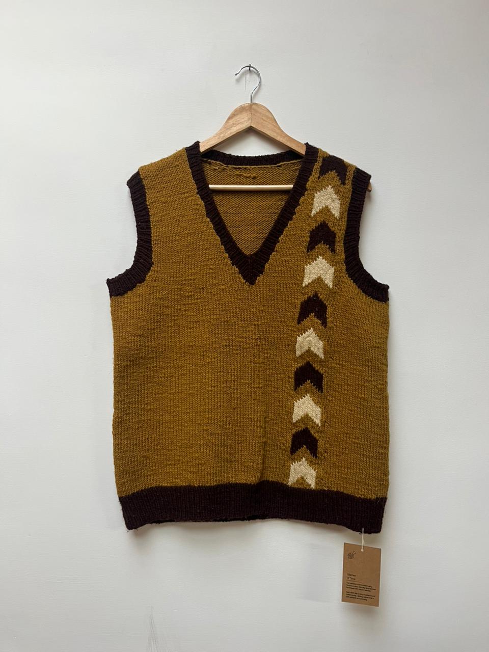 Motif detail handloom wool knit vest in Himalayan indigenous wool for winter layering front view 